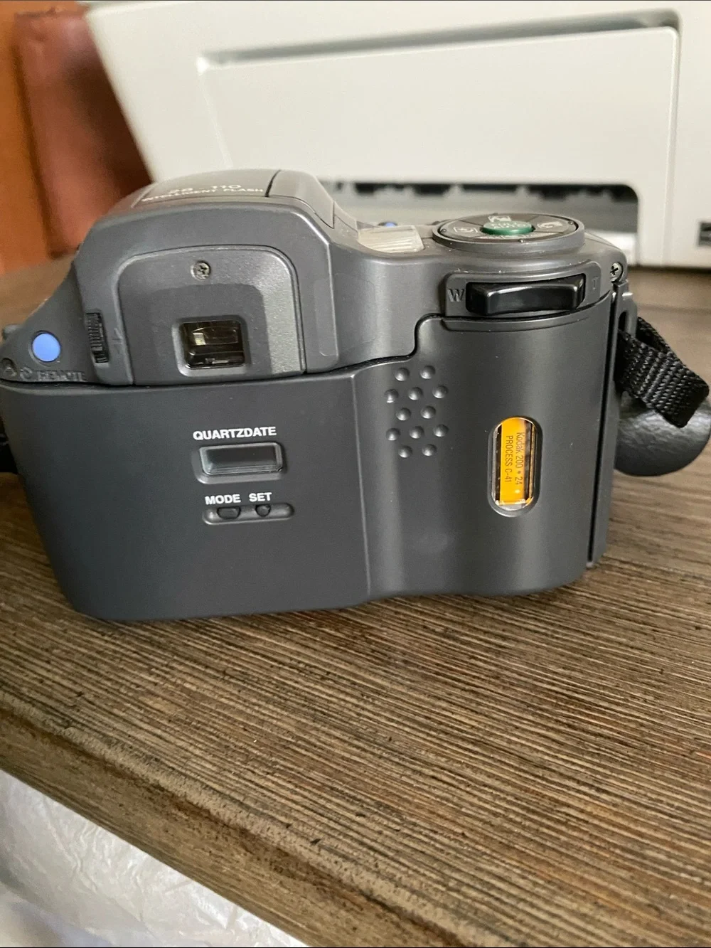 Olympus Digital Camera IS10 with Built-In Flash and Strap